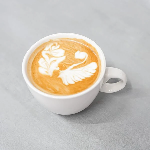 Latte with swan-shaped latte art